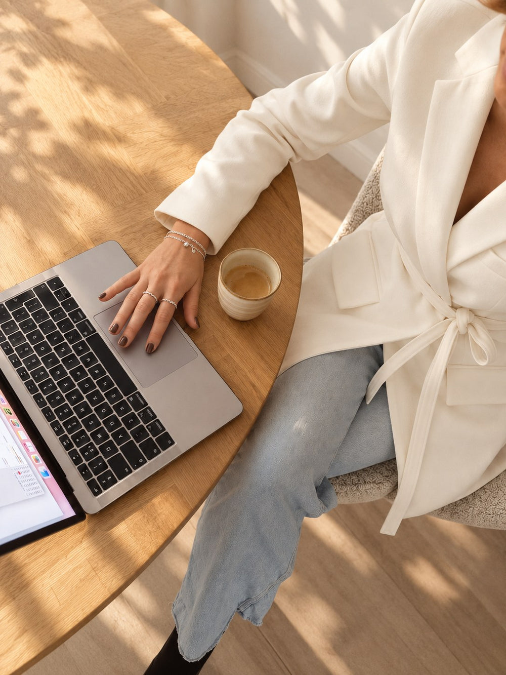 Everyday: sterling silver bracelets and stacking rings at a laptop with coffee