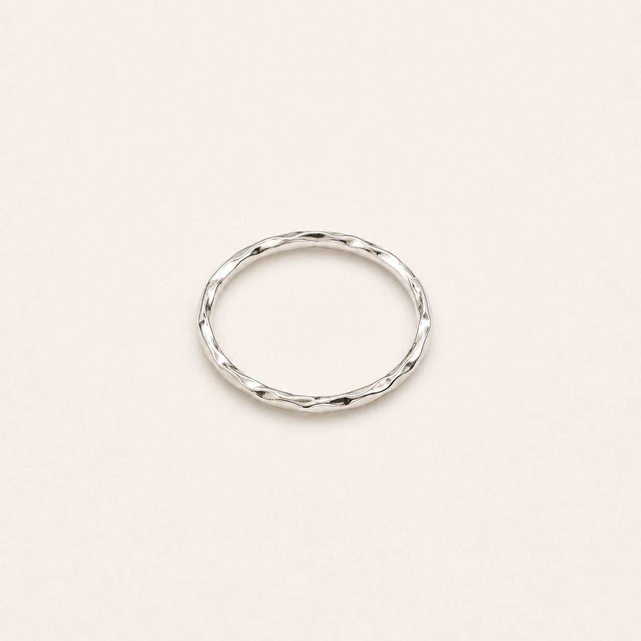 Gemina slim sterling silver ring with an organic hammered texture, size 13
