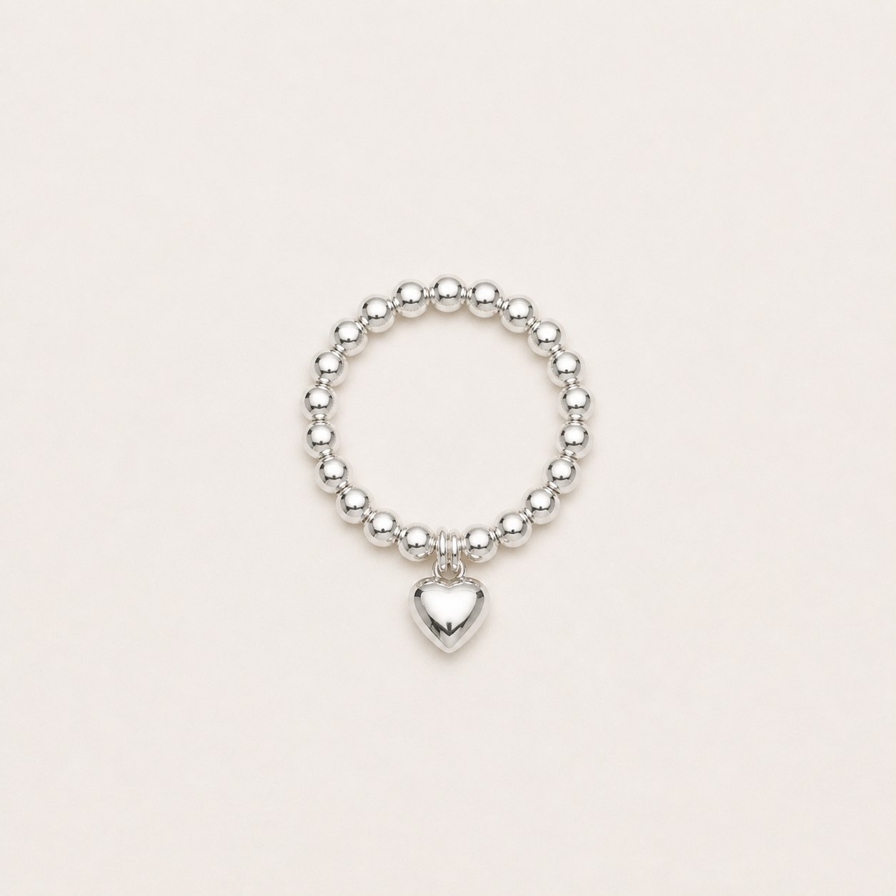Gemina 925 sterling silver beaded stretch ring with a polished 3D heart charm