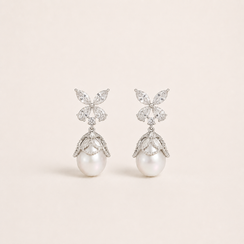 Gemina Eloise marquise crystal butterfly earrings with a teardrop pearl in a beaded lace cap
