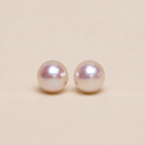 Gemina Aurore pink freshwater pearl stud earrings with a warm rose lustre